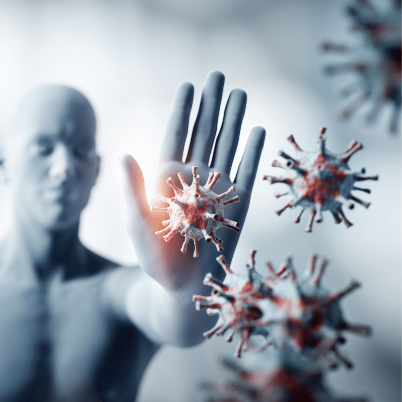 Illustration of a hand blocking virus particles, symbolizing Ashwagandha's immune-boosting benefits on Zaira Natural.