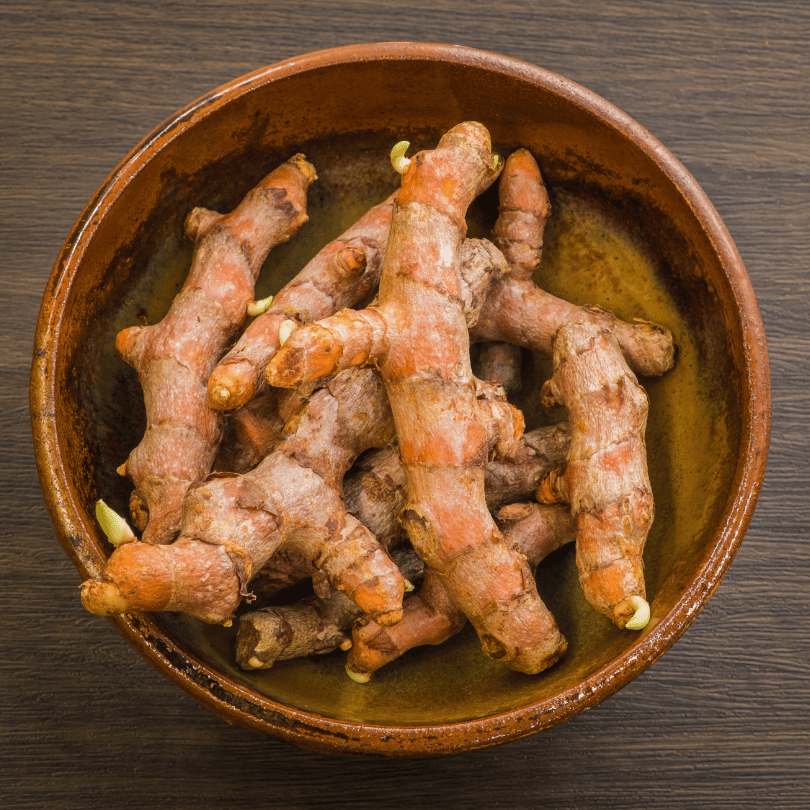 A bowl of fresh Galangal Root (Alpinia galanga), highlighting its antiulcer effects, featured on Zaira Natural.