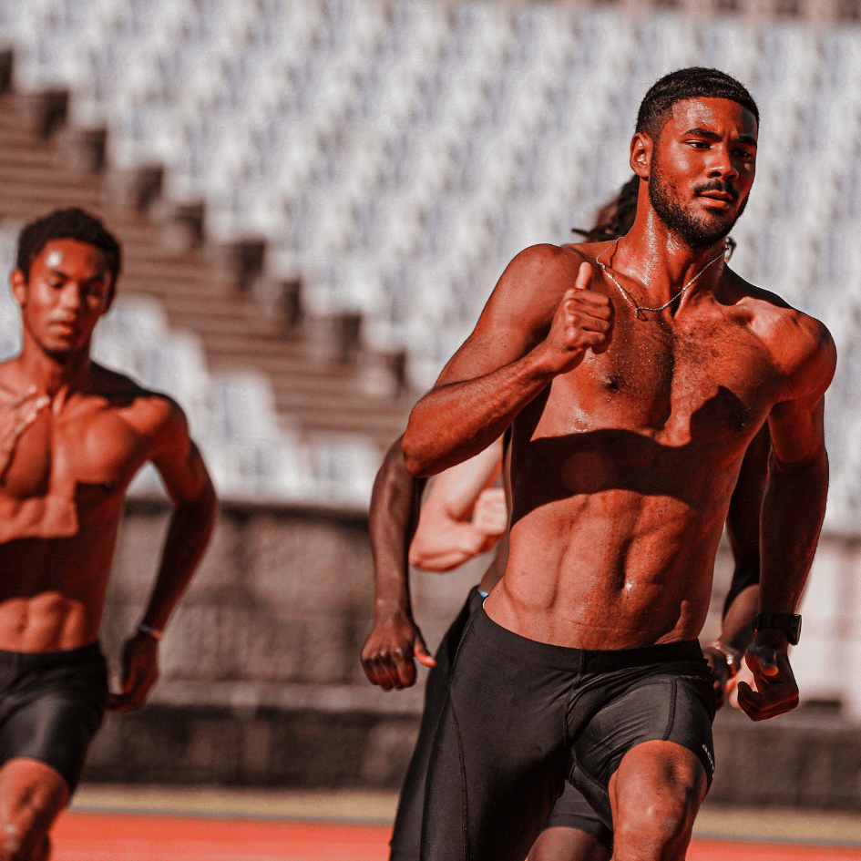 Athletes running on the track, illustrating Muira Puama’s (Ptychopetalum olacoides) role in enhancing energy and stamina, featured on Zaira Natural.