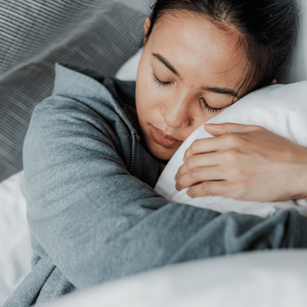 Person resting peacefully, representing Mullein Flower (Verbascum thapsus) benefits for improving sleep and reducing anxiety.